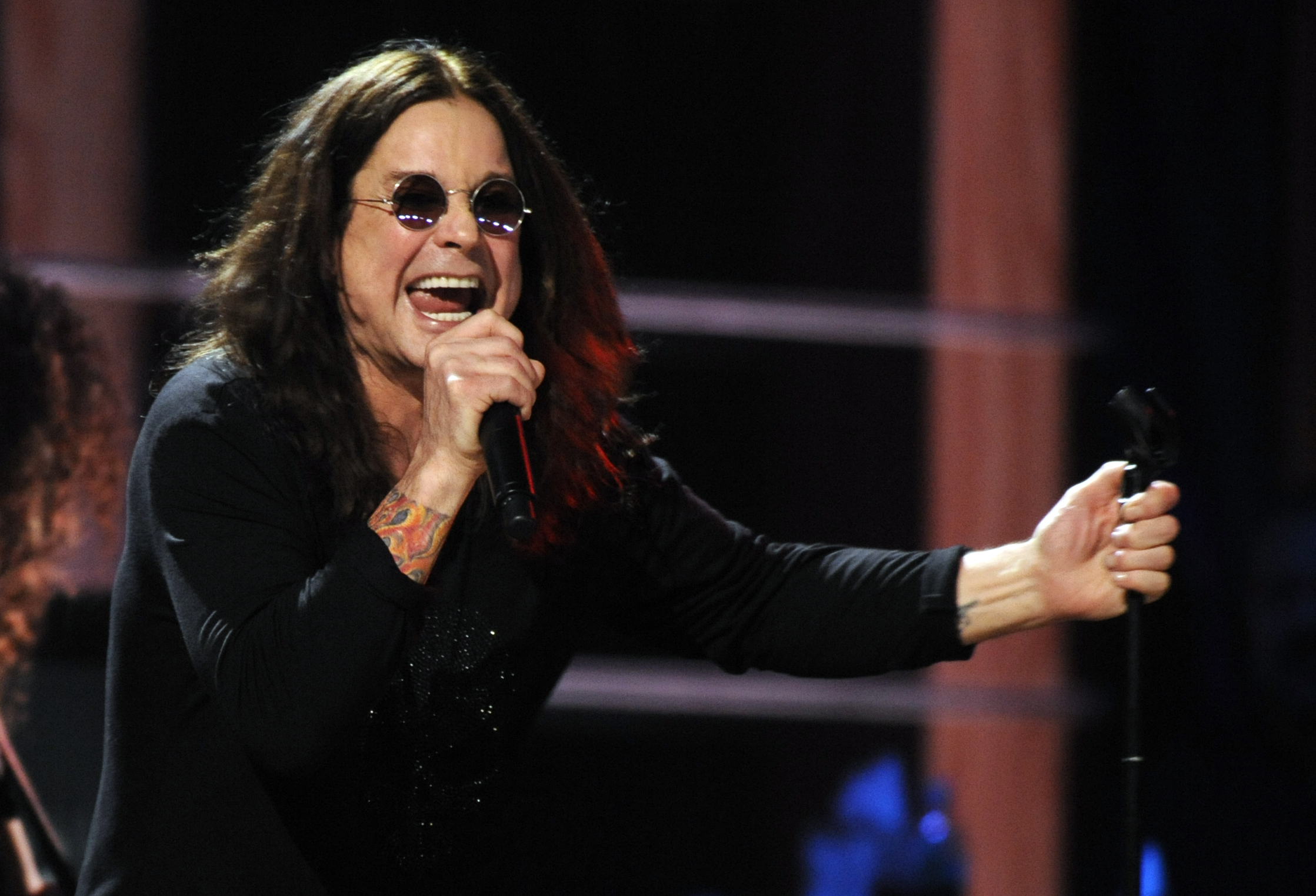 Ozzy Osbourne performs with Metallica at the 25th Anniversary Rock & Roll Hall of Fame concert at Madison Square Garden, Friday, Oct. 30, 2009 in New York. (AP Photo/Henny Ray Abrams)