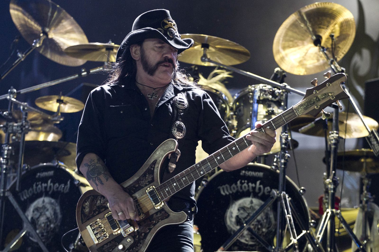 Ian Fraser "Lemmy" Kilmister of Motorhead performs during the Rock in Rio music festival in Rio de Janeiro, Brazil, Sunday Sept.  25, 2011. The festival, which runs through Oct. 2, includes performances by Katy Perry, Rihanna, Stevie Wonder, Red Hot Chili Peppers, Metallica, Guns N' Roses and Coldplay. (AP Photo/Felipe Dana)