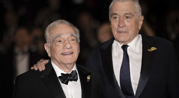 Director Martin Scorsese, left, and Robert De Niro pose for photographers upon departure from the premiere of the film 'Killers of the Flower Moon' at the 76th international film festival, Cannes, southern France, Saturday, May 20, 2023. (Photo by Vianney Le Caer/Invision/AP)
