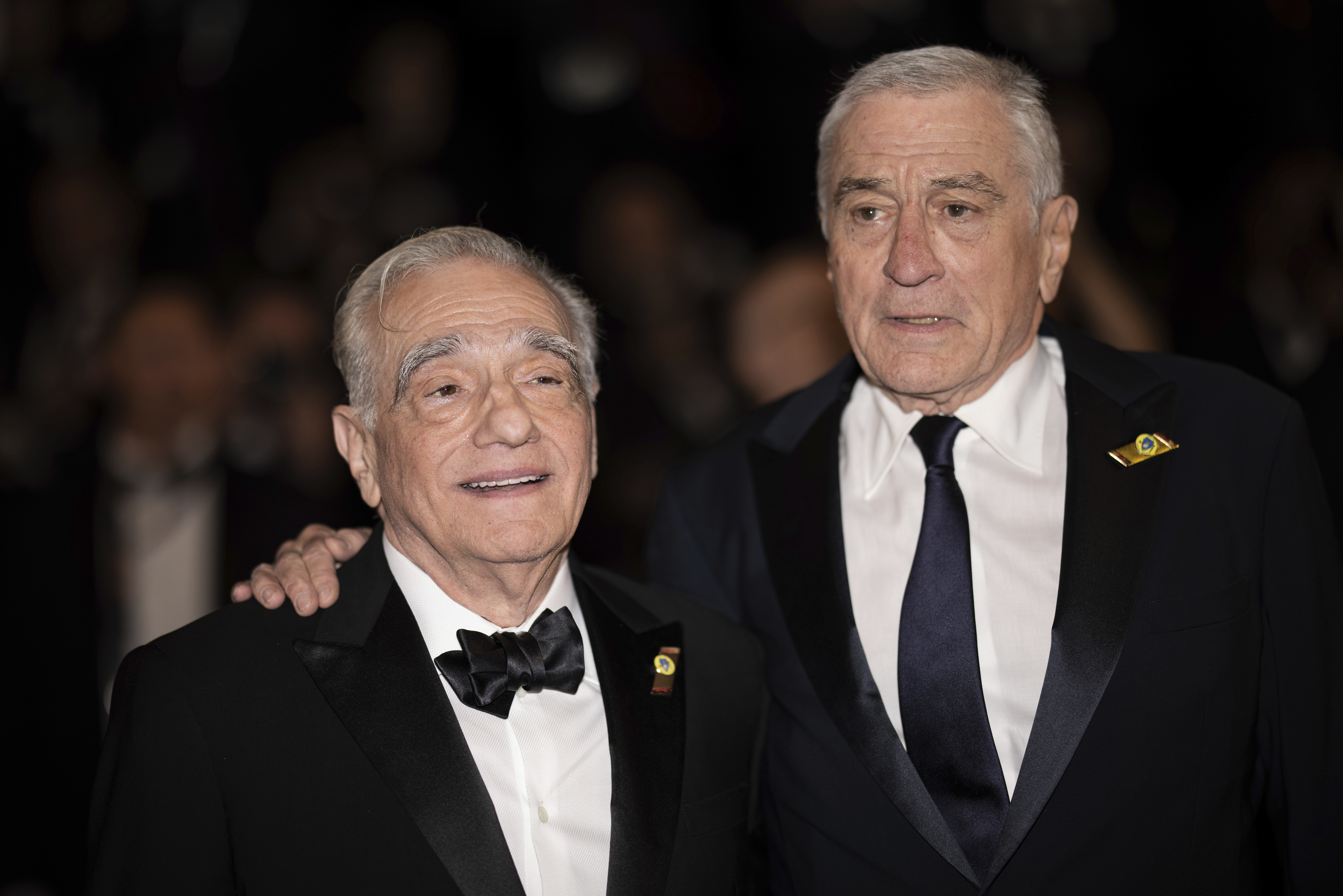 Director Martin Scorsese, left, and Robert De Niro pose for photographers upon departure from the premiere of the film 'Killers of the Flower Moon' at the 76th international film festival, Cannes, southern France, Saturday, May 20, 2023. (Photo by Vianney Le Caer/Invision/AP)
