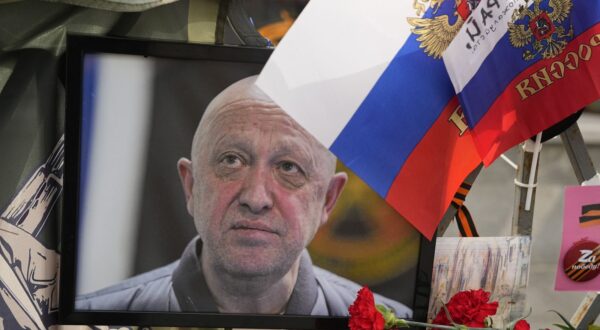 A portrait of the owner of private military company Wagner Group Yevgeny Prigozhin lays at an informal street memorial near the Kremlin in Moscow, Russia, Saturday, Aug. 26, 2023. Dmitry Utkin, whose military call sign Wagner gave the name to the group, is presumed to have died in a plane crash along with Wagner's owner Yevgeny Prigozhin and other military company's officers. (AP Photo/Alexander Zemlianichenko)