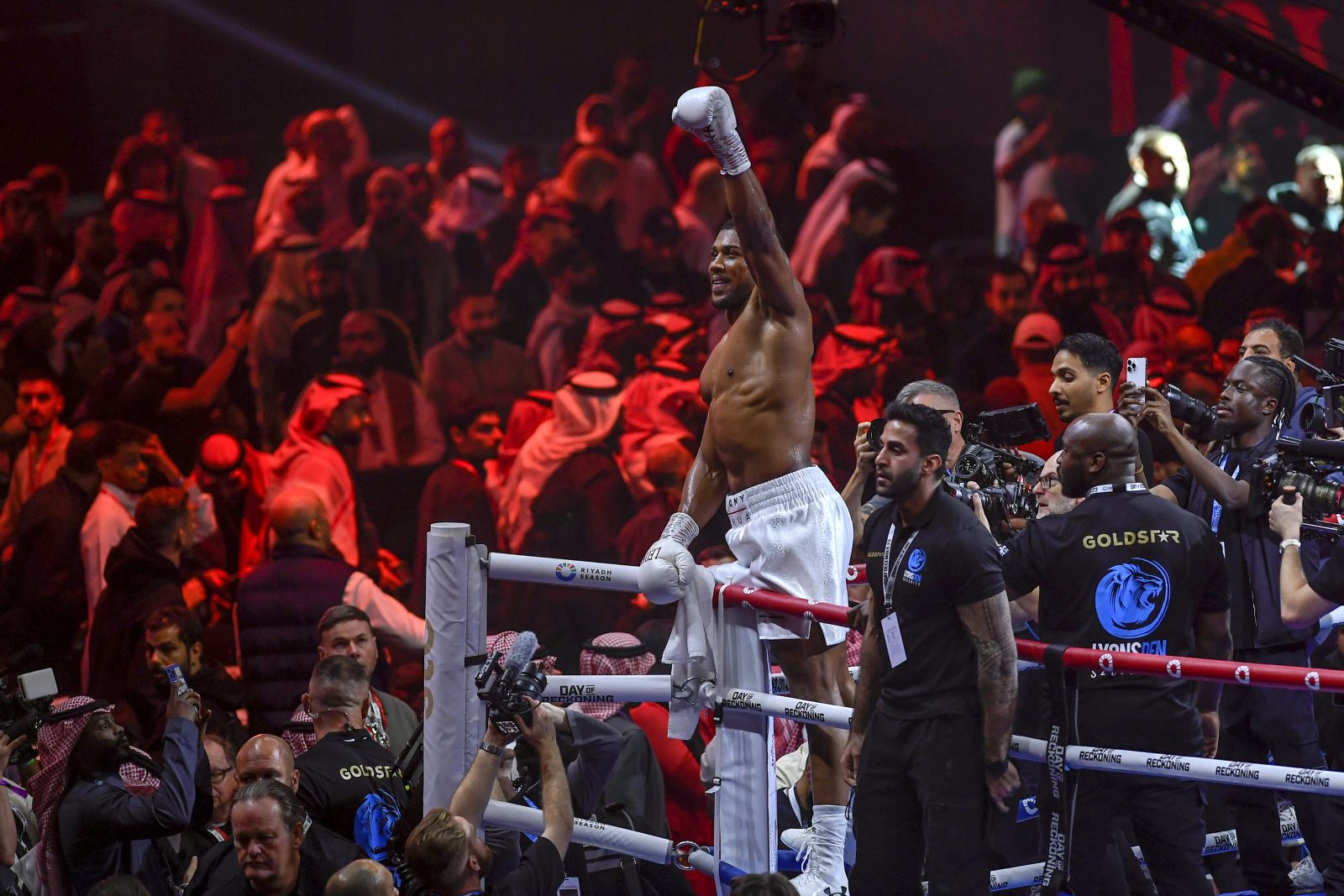 Anthony Joshua celebrates after defeating Otto Wallin in a boxing match at Kingdom Arena in Riyadh, Saudi Arabia, early Sunday, Dec. 24, 2023. (AP Photo)