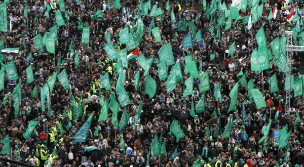 Palestinians Hamas supporters gather during a rally to commemorate the 25th anniversary of the Hamas militant group, in Gaza city, Saturday, Dec. 8, 2012. The Leader of the Islamic militant group Hamas vowed to continue fighting Israel Saturday as hundreds of thousands of flag-waving Gazans turned out for a mass rally to celebrate the 25th anniversary of the Hamas militant group, which has seen its clout and regional acceptance soar since last month's eight-day conflict with Israel. (AP Photo/Hatem Moussa)