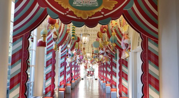 epa10997842 Holiday deocrations in the hallway that runs along the Jacqueline Kennedy Garden of the White House, during a media preview for the 2023 White House holiday display themed the 'Magic, Wonder, and Joy' of the holidays, in Washington, DC, USA, 27 November 2023. The White House is expected to welcome one hundred thousand visitors during the holiday season. Some of the 2023 display includes over twenty-two thousand bells, almost thirty-four thousand ornaments, nearly fifteen thousand feet of ribbon, and ninety-eight Christmas trees across the White House complex.  EPA/MICHAEL REYNOLDS