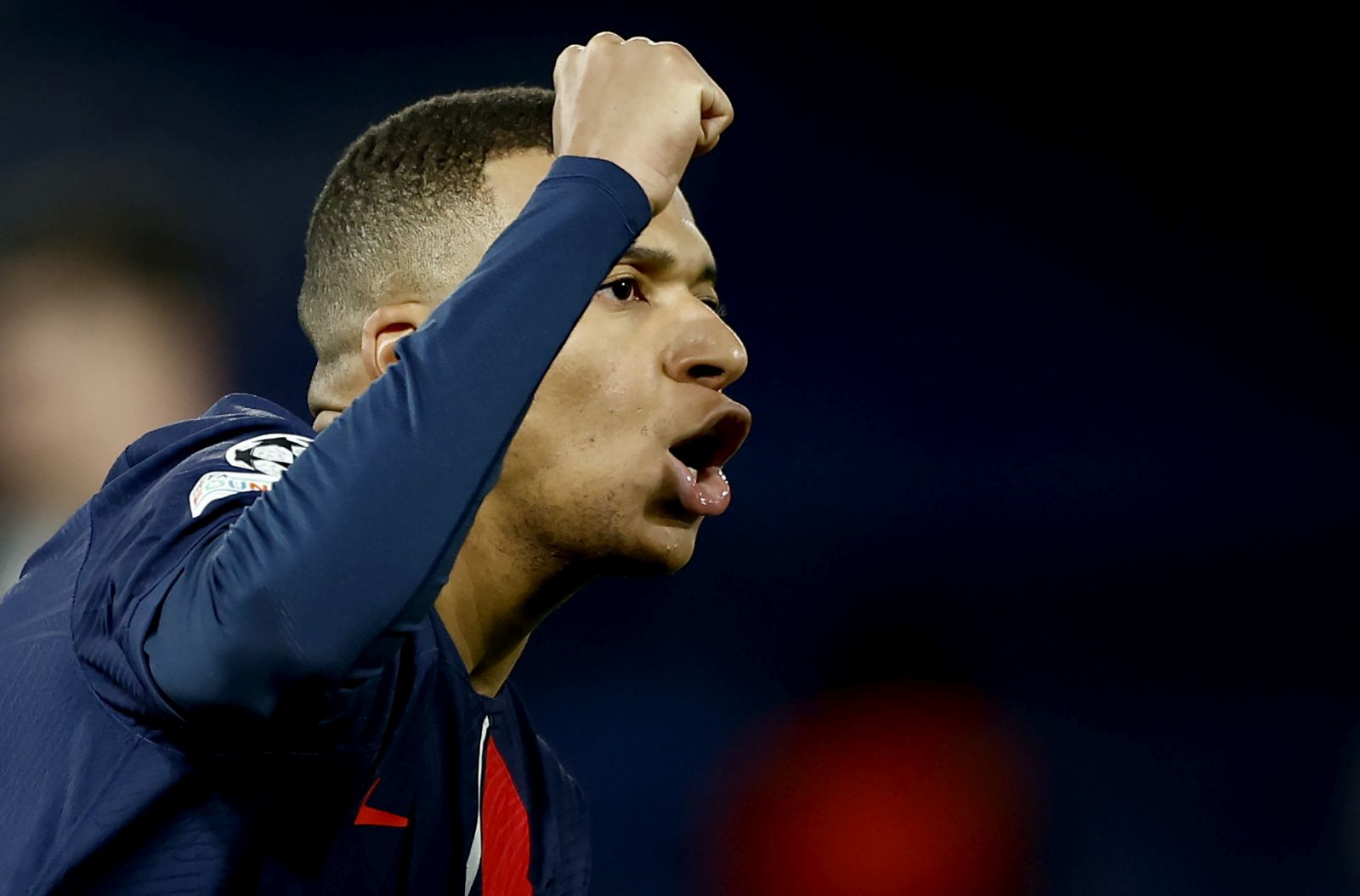 epa11000229 Kylian Mbappe of PSG celebrates after scoring the 1-1 with a penalty during the UEFA Champions League group F match between Paris Saint-Germain and Newcastle United in Paris, France, 28 November 2023.  EPA/YOAN VALAT