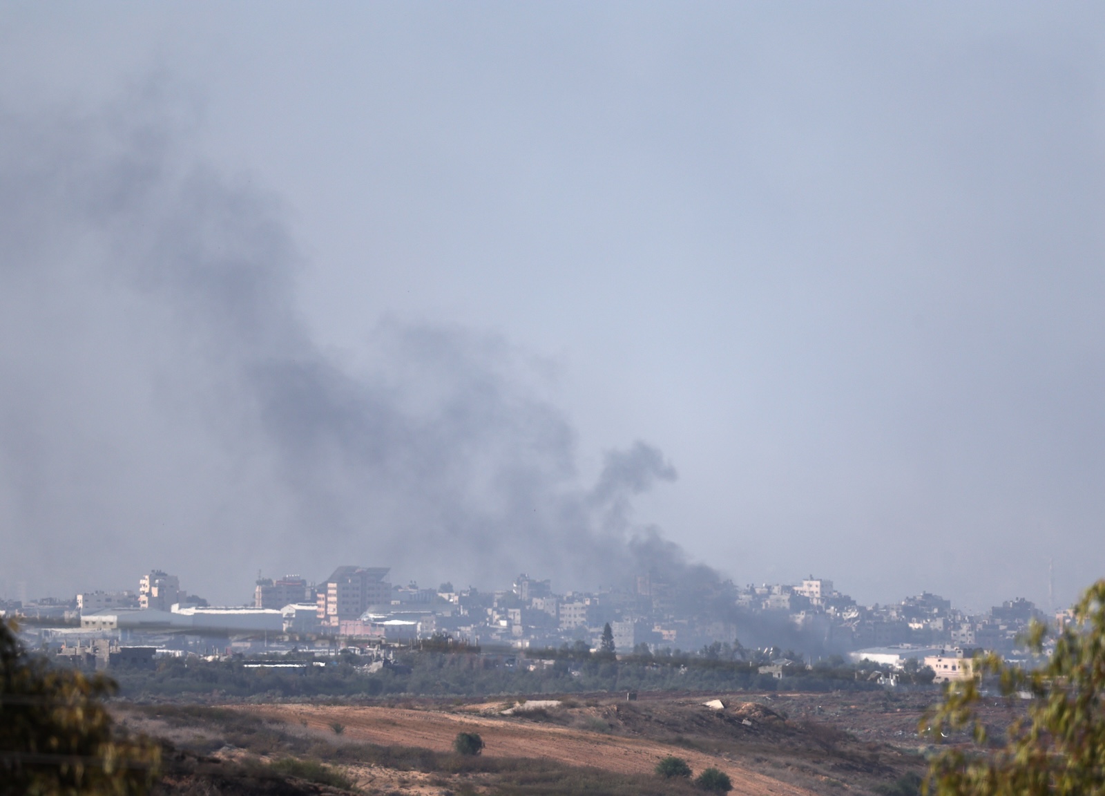 epa11005295 Smoke rises following an Israeli airstrike on Beit Hanoun in northern Gaza, as seen from Sderot, Israel, 01 December 2023. Israeli forces hit targets in the Gaza Strip after a weeklong truce expired on 01 December. More than 15,000 Palestinians and at least 1,200 Israelis have been killed, according to the Gaza Government media office and the Israel Defense Forces (IDF), since Hamas militants launched an attack against Israel from the Gaza Strip on 07 October, and the Israeli operations in Gaza and the West Bank which followed it.  EPA/ATEF SAFADI