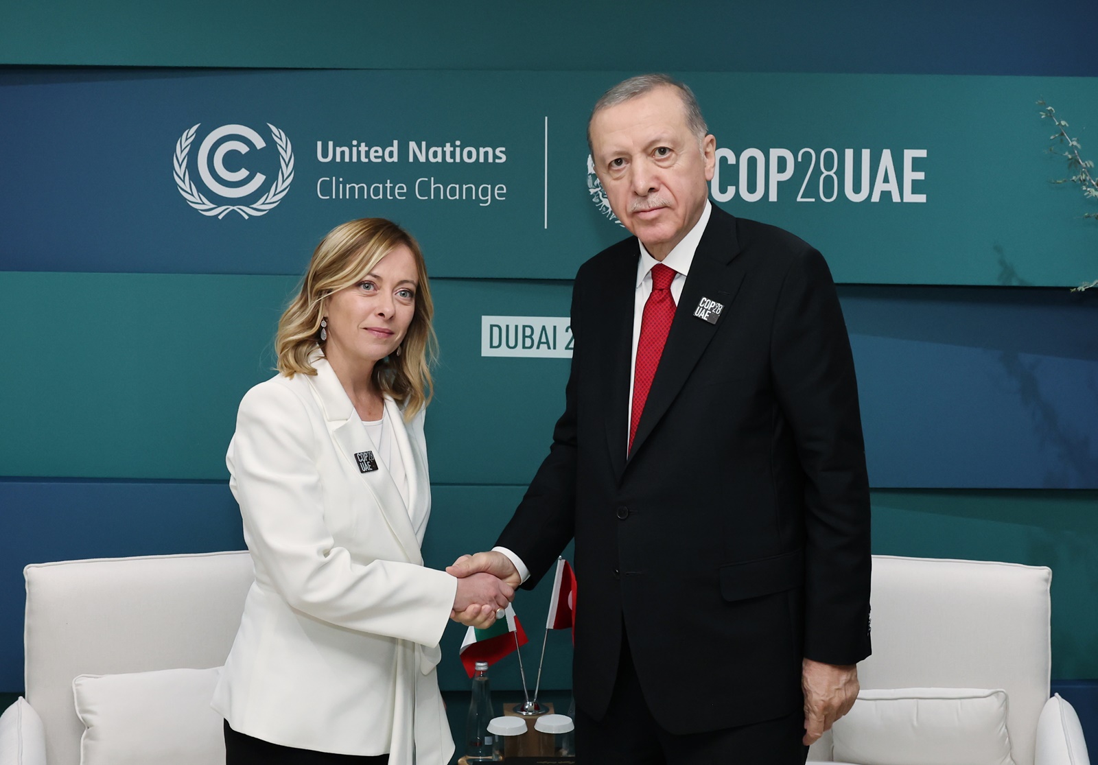 epa11005789 A handout photo made available by Turkish Presidential Press office shows Turkish President Recep Tayyip Erdogan (R) and  Italian Prime Minister Giorgia Meloni during their meeting at the UN Climate Change Conference COP28, in Dubai, United Arab Emirates, 01 December 2023. The 2023 United Nations Climate Change Conference (COP28), runs from 30 November to 12 December, and is expected to host one of the largest number of participants in the annual global climate conference as over 70,000 estimated attendees, including the member states of the UN Framework Convention on Climate Change (UNFCCC), business leaders, young people, climate scientists, Indigenous Peoples and other relevant stakeholders will attend. HANDOUT EDITORIAL USE ONLY/NO SALES  EPA/MURAT CETINMUHURDAR /TURKISH PRESIDENTIAL PRESS OFFICE /HANDOUT  HANDOUT EDITORIAL USE ONLY/NO SALES HANDOUT EDITORIAL USE ONLY/NO SALES