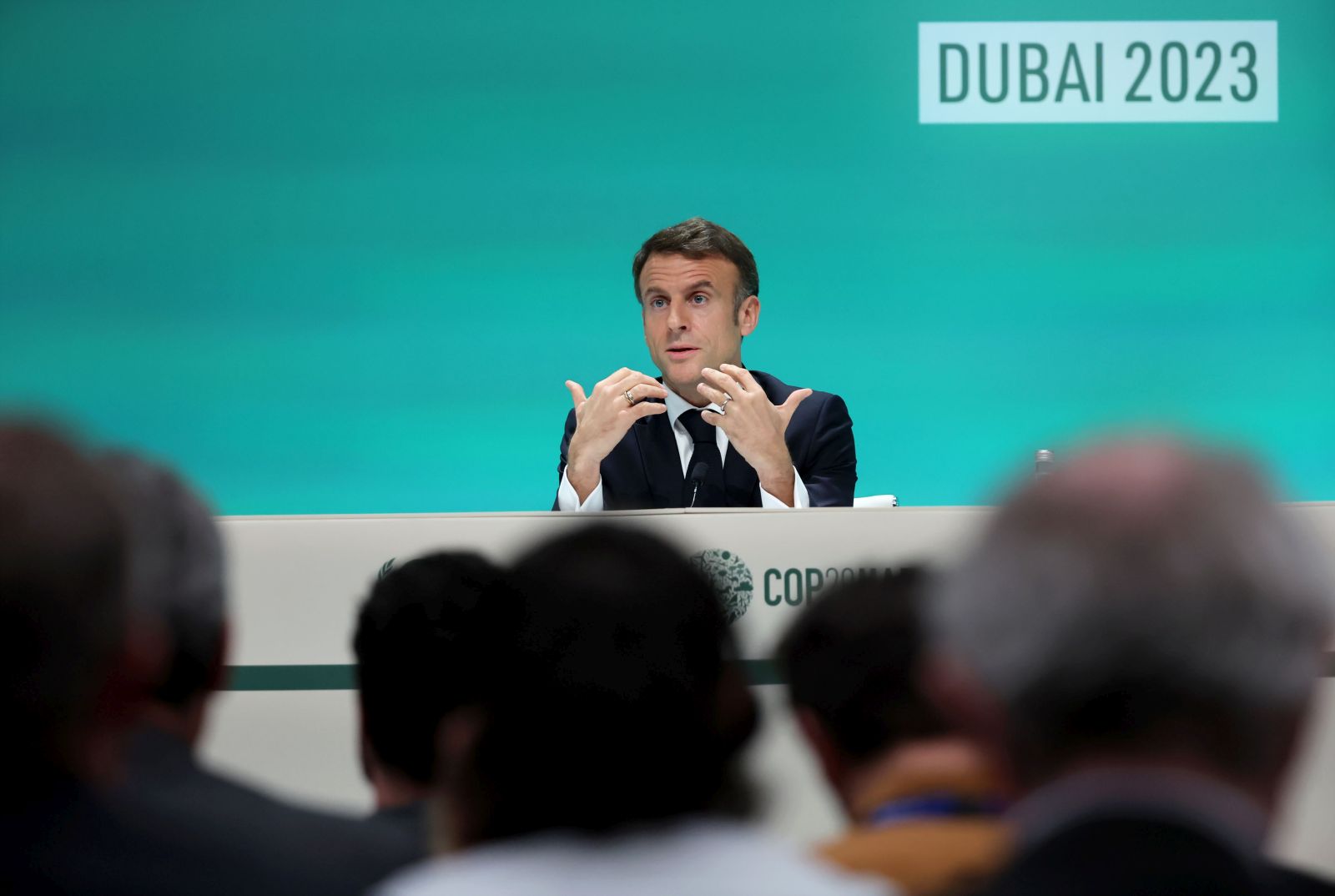 epa11007398 French President Emmanuel Macron speaks during a press conference as part of the third day of the 2023 United Nations Climate Change Conference (COP28) at Expo City Dubai in Dubai, UAE, 02 December 2023. The 2023 United Nations Climate Change Conference (COP28), runs from 30 November to 12 December, and is expected to host one of the largest number of participants in the annual global climate conference as over 70,000 estimated attendees, including the member states of the UN Framework Convention on Climate Change (UNFCCC), business leaders, young people, climate scientists, Indigenous Peoples and other relevant stakeholders will attend.  EPA/ALI HAIDER