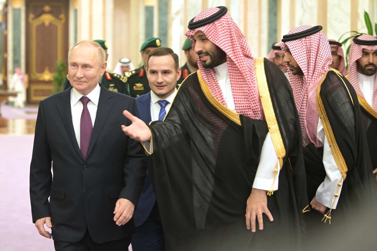 epa11014305 Saudi Arabian Crown Prince Mohammed bin Salman Al Saud (C) welcomes Russian President Vladimir Putin (L), during their meeting at Al Yamamah Palace in Riyadh, Saudi Arabia, 06 December 2023. During his one day working visits to UAE and Saudi Arabia, Putin will talk with the leaders of the countries, together with delegations that will include members of the government and representatives of the fuel and energy complex, and personally to discuss cooperation within OPEC+, Ukraine and the Middle East.  EPA/ALEXEI NIKOLSKY / SPUTNIK / KREMLIN POOL MANDATORY CREDIT