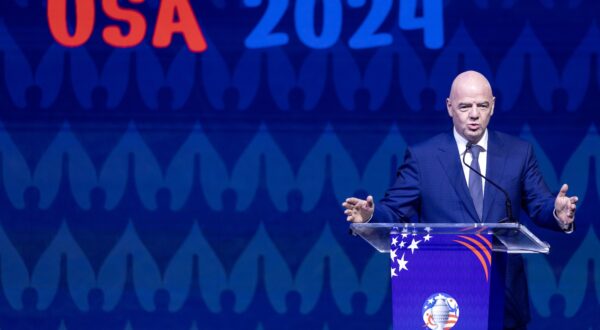 epa11016580 FIFA President Gianni Infantino speaks during the Copa America 2024 group stage draw ceremony in Miami, Florida, USA, 07 December 2023. The Copa America, hosted in the USA, will feature the usual 10 South American nations along with six North American guests.  EPA/CRISTOBAL HERRERA-ULASHKEVICH