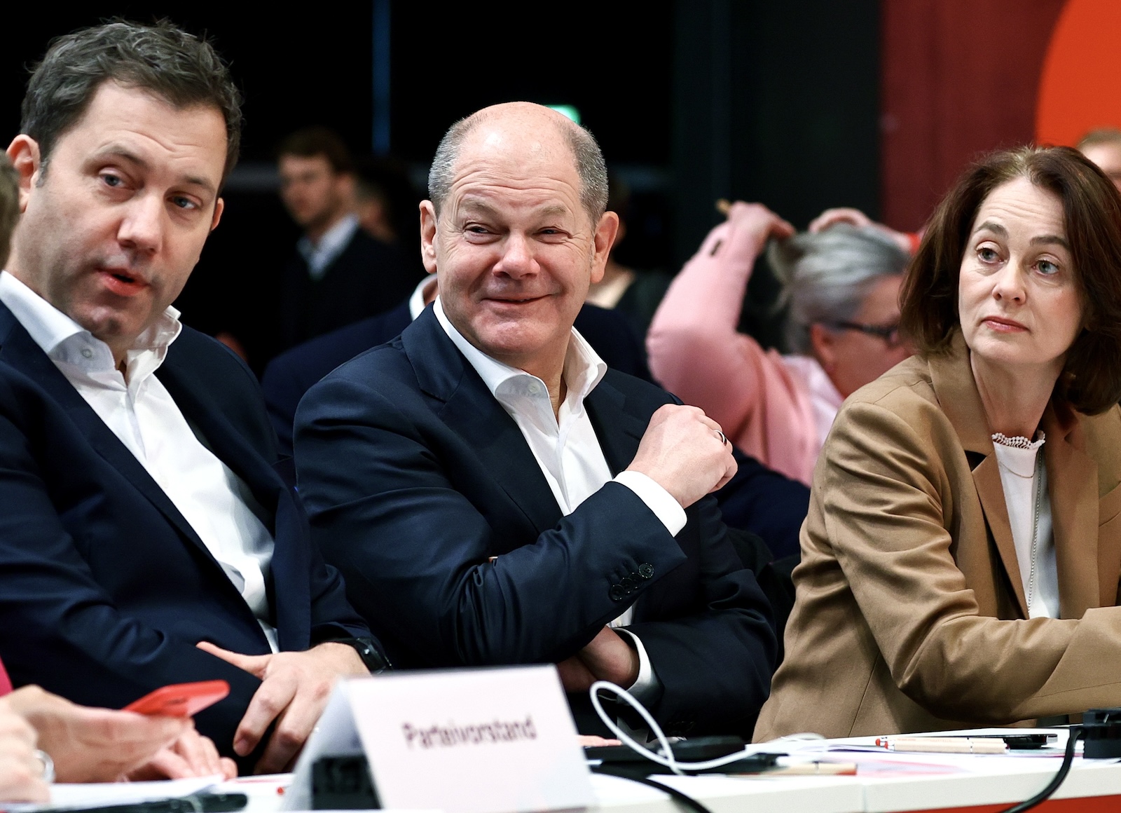 epa11017076 (L-R) Social Democratic Party (SPD) co-chairman Lars Klingbeil, German Chancellor Olaf Scholz and member of Germany's Social Democratic SPD party Katarina Barley attend the German Social Democrats (SPD) party conference in Berlin, Germany, 08 December 2023. The first SPD three-day party conference in two years starts on 08 December in Berlin.  EPA/FILIP SINGER