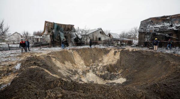 epa11022648 A crater caused by a Russian missile strike in Kyiv, Ukraine, 11 December 2023. Russia attacked the Kyiv region with eight ballistic missiles, all of which were reportedly shot down by air defenses.
The falling debris injured one man in his early 30s, and three women were diagnosed with an acute stress reaction due to the attack, said Serhii Popko, the head of the city's military administration.  EPA/Sergey Dolzhenko