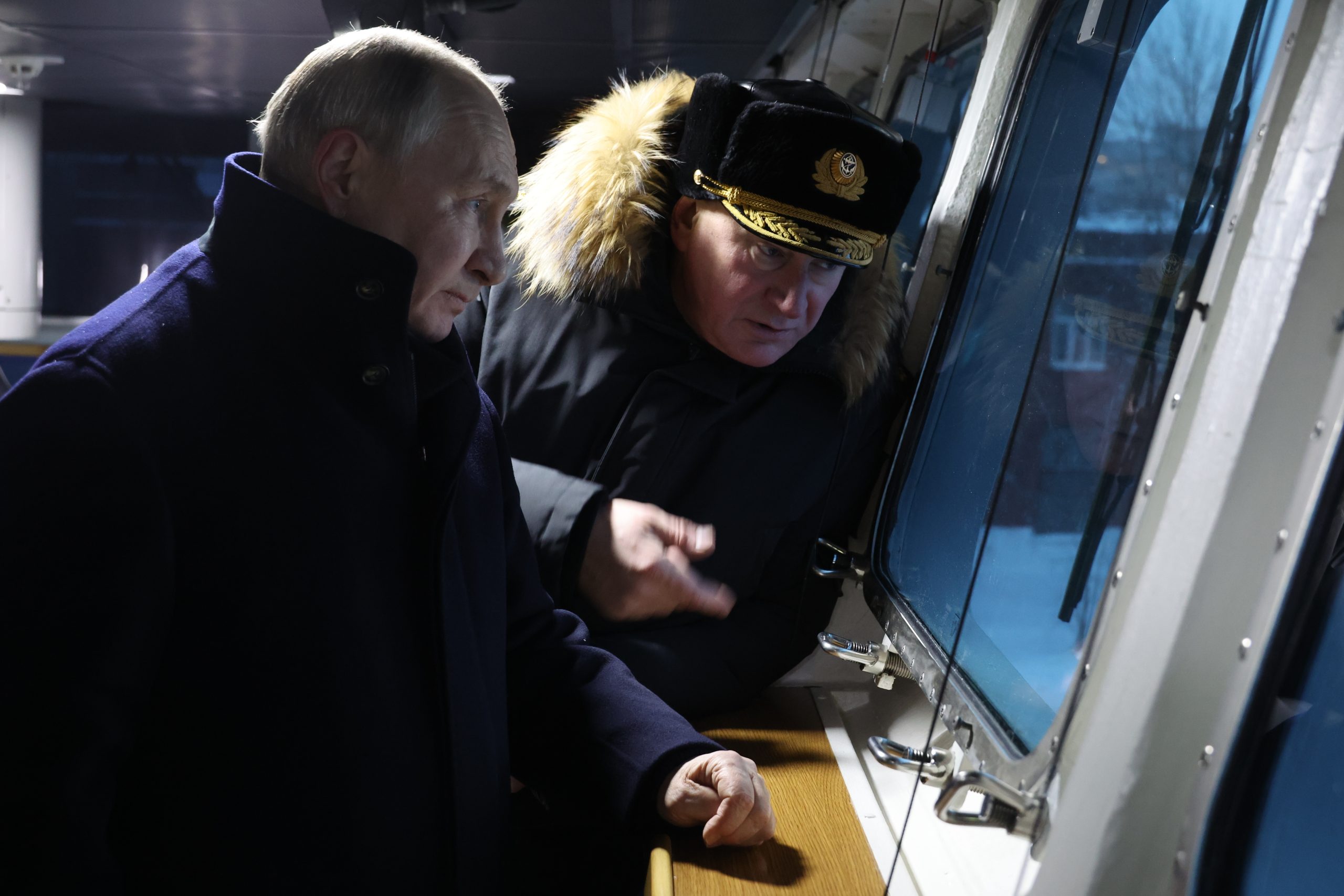 epa11023047 Russian President Vladimir Putin (L), accompanied by Commander-in-Chief of the Russian Navy Nikolai Yevmenov (R), visits the Russian Navy Northern Fleet's frigate Admiral Kasatonov at the Sevmash Shipyard, a subsidiary of the United Shipbuilding Corporation, in Severodvinsk, Arkhangelsk region, Russia, 11 December 2023. Vladimir Putin took part in the ceremony of commissioning two new nuclear submarines into the Navy - the multipurpose submarine 'Krasnoyarsk' and the strategic submarine 'Emperor Alexander III'. A series of fourth-generation nuclear submarines of the Borei and Borei-A projects, armed with Bulava intercontinental ballistic missiles, will become the basis of naval strategic nuclear forces for the coming decades, the Russian military said.  EPA/MIKHAEL KLIMENTYEV/SPUTNIK/KREMLIN POOL MANDATORY CREDIT