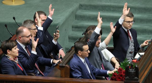 epa11023126 Members of the Polish Law and Justice government vote of confidence on Mateusz Morawiecki's (C) government at the Sejm, the lower house of parliament, in Warsaw, Poland, 11 December 2023. Polish Law and Justice government has lost a vote of confidence in the Sejm, the lower house of parliament. There were 190 votes in favour of the government led by Mateusz Morawiecki, 266 votes against and no abstentions. The Sejm will now appoint a new candidate for prime minister, which will almost certainly be Donald Tusk, the candidate put forward by the Civic Coalition, the Third Way and the Left.  EPA/PAWEL SUPERNAK POLAND OUT