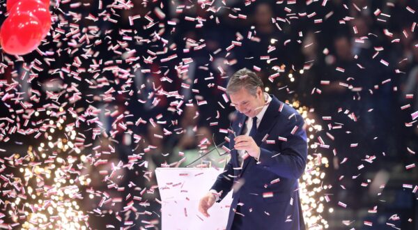 epa11008037 Serbian President Aleksandar Vucic is showered with confetti during the Serbian Progressive Party (SNS) pre-election campaign rally in Belgrade, Serbia, 02 December 2023. Voters in Serbia will elect a new parliament and local authorities in 64 municipalities on 17 December 2023.  EPA/ANDREJ CUKIC