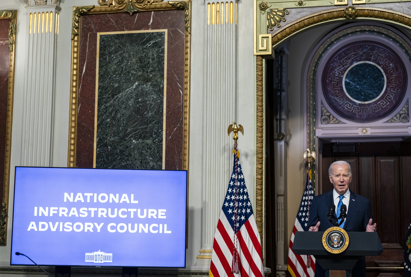 epa11027386 US President Joe Biden (C) speaks during a meeting of the National Infrastructure Advisory Council in the Indian Treaty Room of the White House in Washington, DC, USA, 13 December 2023. President Biden warned on 12 December that failing to approve additional funding for Ukraine would embolden the Russian President, and threaten to derail Ukraine's path toward becoming a country that was 'proud, free and firmly rooted in the West'.  EPA/AL DRAGO / POOL