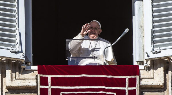 epa11034025 Pope Francis waves to the crowd from the window of the apostolic palace overlooking St. Peter's square during the weekly Angelus prayer, Vatican City, 17 December 2023. Pope Francis on 17 December celebrates his 87th birthday.  EPA/ANGELO CARCONI