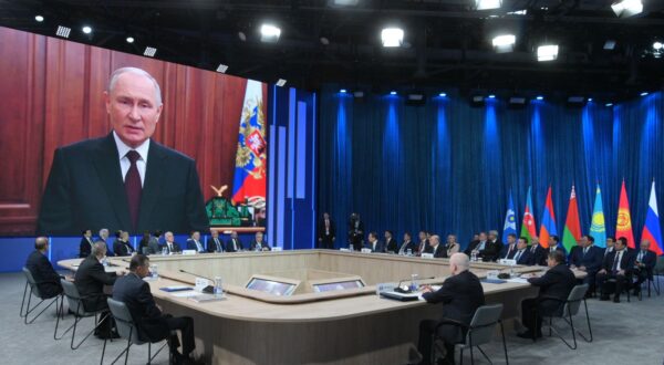 epa11035560 Russian President Vladimir Putin is seen on a screen during a video address for the Commonwealth of Independent States (CIS) Heads of Government Council in Moscow, Russia, 18 December 2023.  EPA/ALEXANDER ASTAFYEV/ SPUTNIK / GOVERNMENT PRESS SERVICE / POOL MANDATORY CREDIT