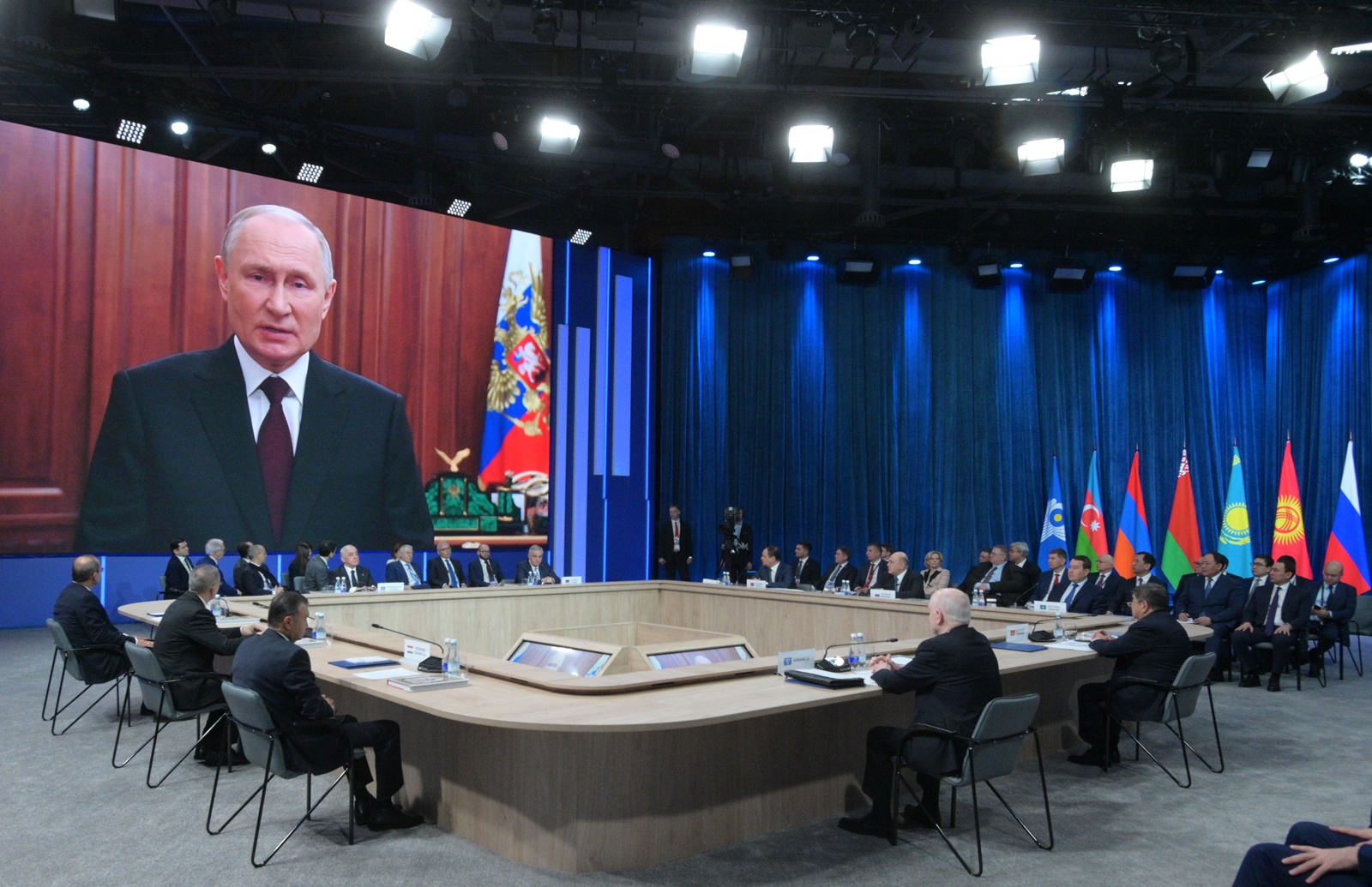 epa11035560 Russian President Vladimir Putin is seen on a screen during a video address for the Commonwealth of Independent States (CIS) Heads of Government Council in Moscow, Russia, 18 December 2023.  EPA/ALEXANDER ASTAFYEV/ SPUTNIK / GOVERNMENT PRESS SERVICE / POOL MANDATORY CREDIT