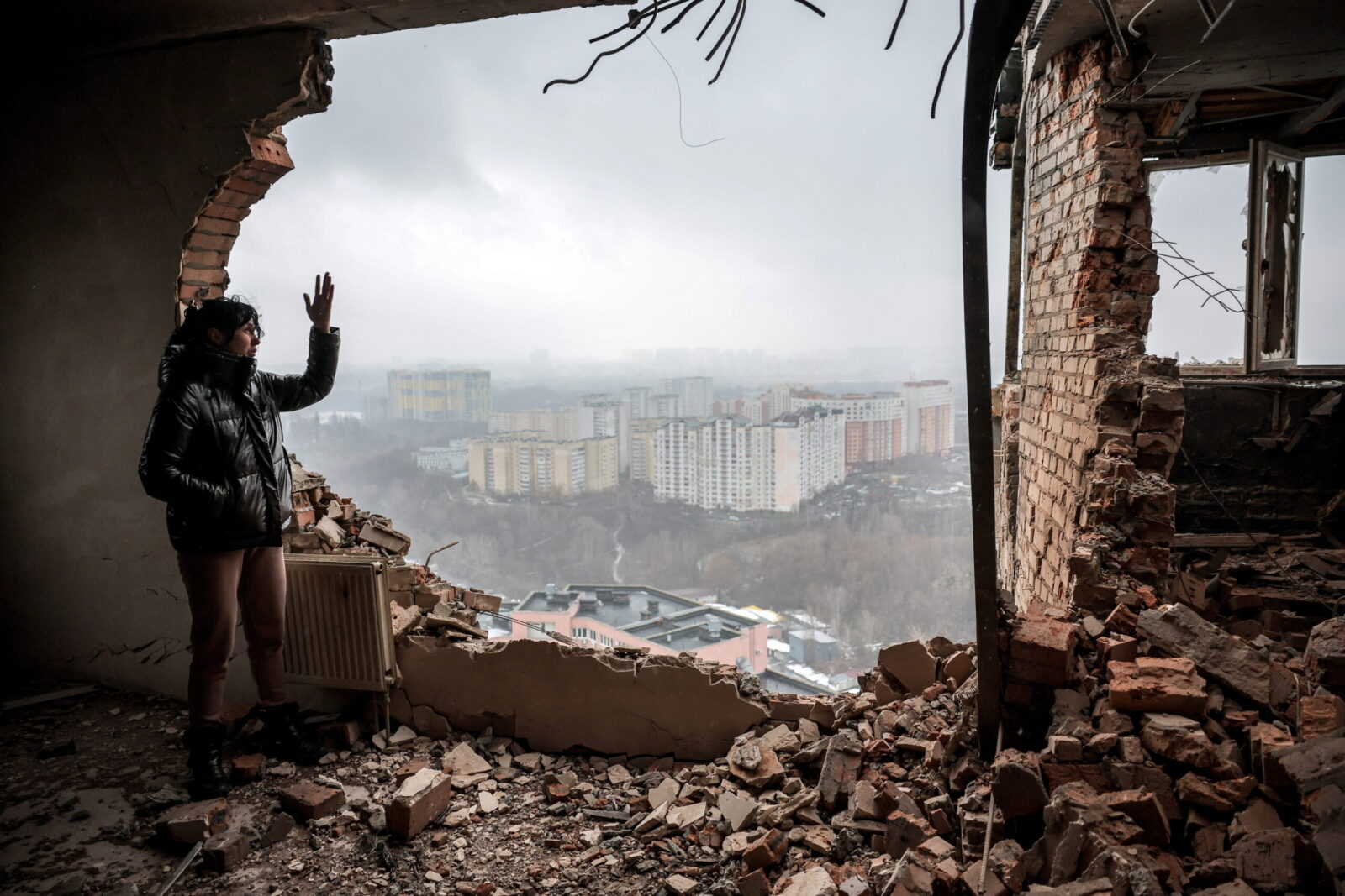 epa11040621 Local resident Tetiana (40) inspects her ruined flat at the site of a drone attack on a residential building in Kyiv (Kiev), Ukraine, 22 December 2023, amid the Russian invasion. At least two people were injured after a Russian drone attack hit a residential building in the Solomianskyi district of Kyiv, the mayor of the city Vitali Klitschko wrote on telegram. For the third time in the last six days, Russia's 'Shahed' type drones attempted to hit infrastructure and residential buildings in the Ukrainian capital, the Kyiv City Military Administration said. Russian troops entered Ukrainian territory on 24 February 2022, starting a conflict that has provoked destruction and a humanitarian crisis.  EPA/Oleg Petrasyuk