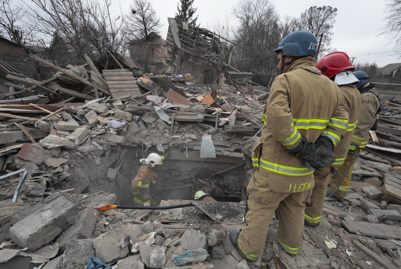 epaselect epa11048118 Ukrainian rescuers work among the rubble of a private building after shelling in Zaporizhzhia, southeastern Ukraine, 29 December 2023, amid the Russian invasion. At least 18 people have died and over 130 were injured after Russia launched a wave of airstrikes across Ukraine, Ukraine's Ministry of Internal Affairs said on 29 December. Strikes were reported in Kyiv, Lviv, Odesa, Dnipro, Kharkiv, Zaporizhzhia, and other Ukrainian cities. Russia launched 'more than 150 missiles and combat drones' at Ukrainian cities, Ukraine's Prosecutor General Andriy Kostin said in a statement, adding that extensive damage included residential buildings, educational institutions and hospitals. Russian troops entered Ukraine on 24 February 2022 starting a conflict that has provoked destruction and a humanitarian crisis.  EPA/KATERYNA KLOCHKO