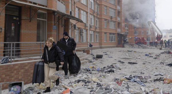 epa11048268 Locals carrying their belongings walk among debris after leaving their flat at the site of a damaged residential building after shelling in Odesa, southwestern Ukraine, 29 December 2023, amid the Russian invasion. At least 18 people have died and over 130 were injured after Russia launched a wave of airstrikes across Ukraine, Ukraine's Ministry of Internal Affairs said on 29 December. Strikes were reported in Kyiv, Lviv, Odesa, Dnipro, Kharkiv, Zaporizhzhia, and other Ukrainian cities. Russia launched 'more than 150 missiles and combat drones' at Ukrainian cities, Ukraine's Prosecutor General Andriy Kostin said in a statement, adding that extensive damage included residential buildings, educational institutions and hospitals. Russian troops entered Ukraine on 24 February 2022 starting a conflict that has provoked destruction and a humanitarian crisis.  EPA/IHOR HORA