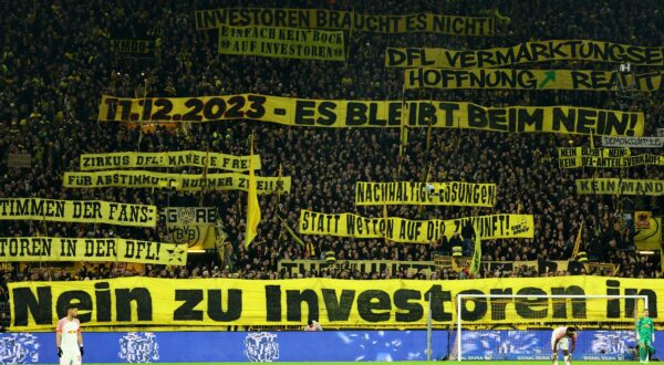 Soccer Football - Bundesliga - Borussia Dortmund v RB Leipzig - Signal Iduna Park, Dortmund, Germany - December 9, 2023 Borussia Dortmund fans display banners in the stands during the match REUTERS/Wolfgang Rattay DFL REGULATIONS PROHIBIT ANY USE OF PHOTOGRAPHS AS IMAGE SEQUENCES AND/OR QUASI-VIDEO. Photo: Wolfgang Rattay/REUTERS