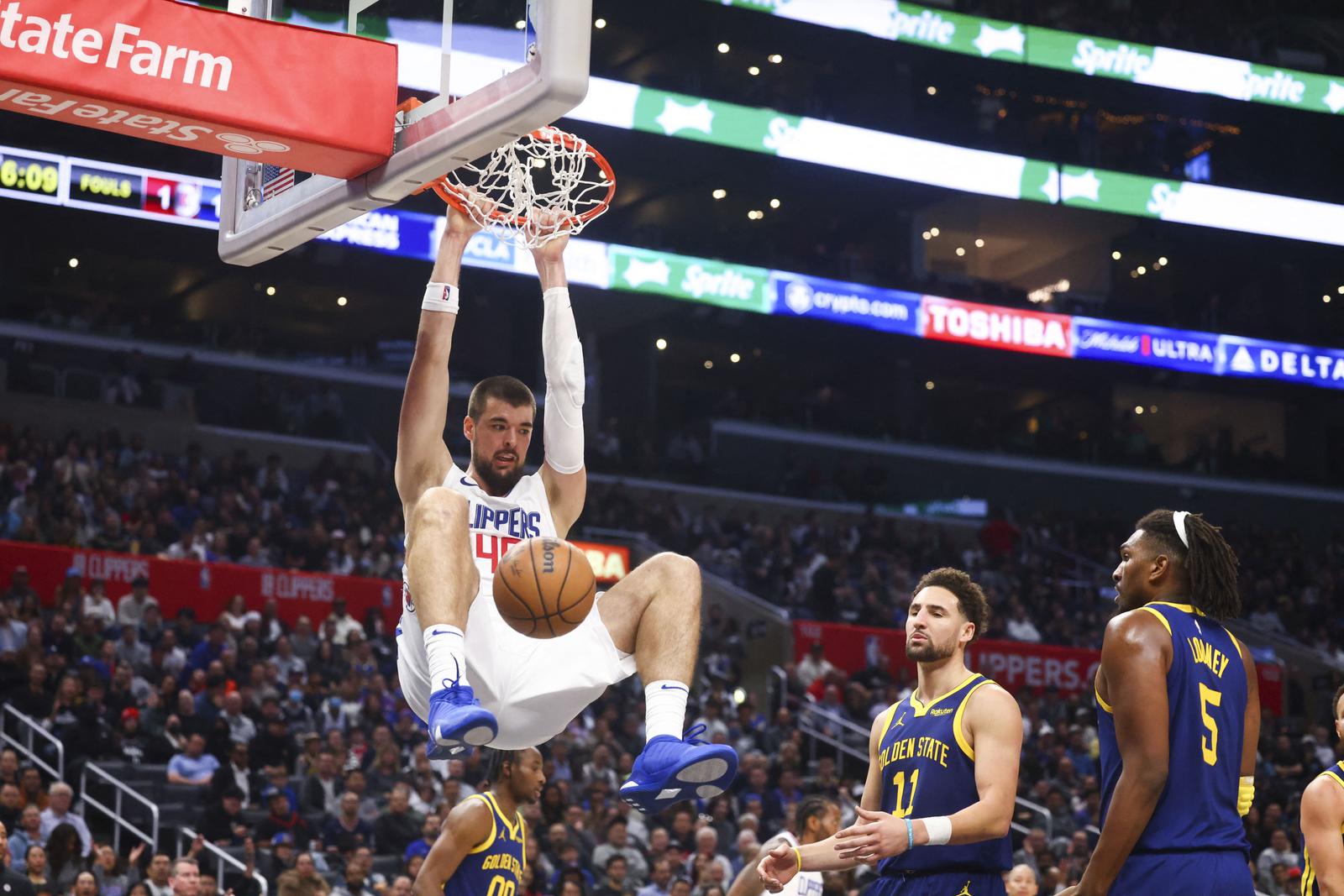 Dec 14, 2023; Los Angeles, California, USA; LA Clippers center Ivica Zubac (40) dunks against the Golden State Warriors during the second half of the game at Crypto.com Arena. Mandatory Credit: Jessica Alcheh-USA TODAY Sports Photo: Jessica Alcheh/REUTERS
