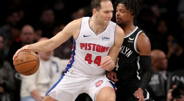 Dec 23, 2023; Brooklyn, New York, USA; Detroit Pistons forward Bojan Bogdanovic (44) controls the ball against Brooklyn Nets guard Dennis Smith Jr. (4) during the second quarter at Barclays Center. Mandatory Credit: Brad Penner-USA TODAY Sports Photo: Brad Penner/REUTERS