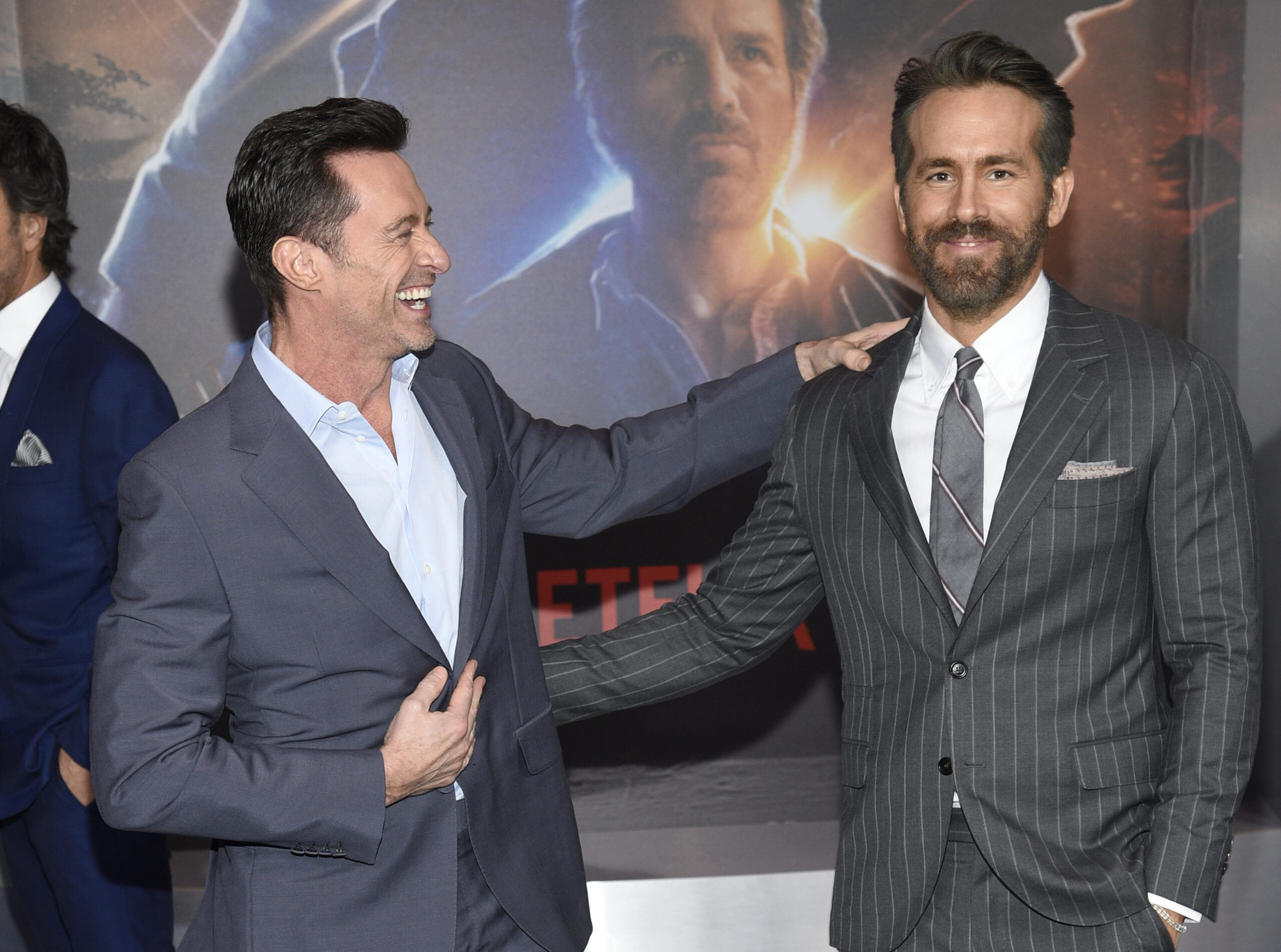 Actors Hugh Jackman, left, and Ryan Reynolds pose together at the world premiere of "The Adam Project" at Alice Tully Hall on Monday, Feb. 28, 2022, in New York. (Photo by Evan Agostini/Invision/AP)