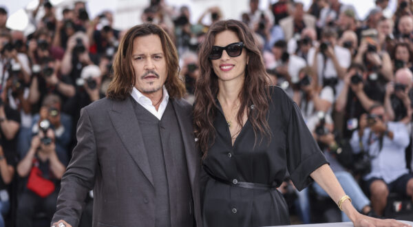 Johnny Depp, left, and director Maiwenn pose for photographers at the photo call for the film 'Jeanne du Barry' at the 76th international film festival, Cannes, southern France, Wednesday, May 17, 2023. (Photo by Vianney Le Caer/Invision/AP)