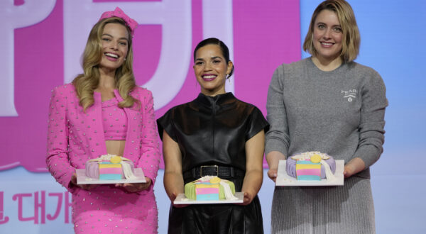 Cast members Margot Robbie, America Ferrera, and director Greta Gerwig, from left to right, pose for the media after a news conference of the movie "Barbie." in Seoul, South Korea, Monday, July 3, 2023. The film is to be released in the country on July 19. (AP Photo/Lee Jin-man)