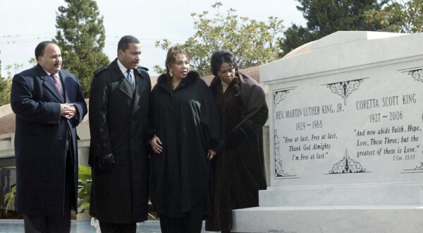 FILE - The children of the Rev. Martin Luther King Jr. and Coretta Scott King, from left, Martin Luther King, Jr. III, Dexter King, Yolanda King and Bernice King stand next to a new crypt dedicated to their parents in Atlanta, Monday Nov. 20, 2006. The King Center in Atlanta said Dexter, the 62-year-old son of the civil rights leader, died Monday, Jan. 22, 2024 at his California home after battling prostate cancer. (AP Photo/W.A. Harewood, File)
