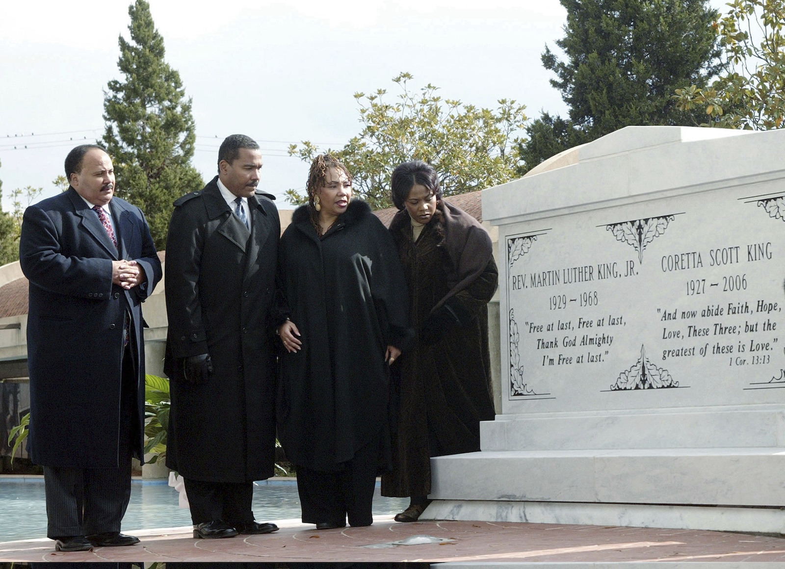 FILE - The children of the Rev. Martin Luther King Jr. and Coretta Scott King, from left, Martin Luther King, Jr. III, Dexter King, Yolanda King and Bernice King stand next to a new crypt dedicated to their parents in Atlanta, Monday Nov. 20, 2006. The King Center in Atlanta said Dexter, the 62-year-old son of the civil rights leader, died Monday, Jan. 22, 2024 at his California home after battling prostate cancer. (AP Photo/W.A. Harewood, File)