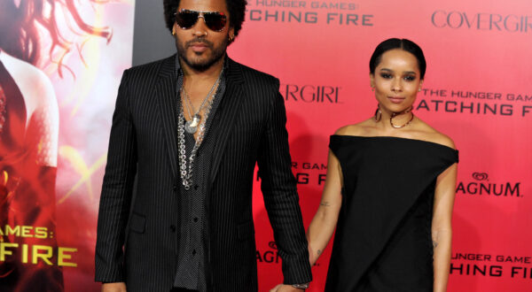 Lenny Kravitz, left, and Zoe Kravitz arrive at the Los Angeles premiere of "The Hunger Games: Catching Fire"  at Nokia Theatre LA Live on Monday, Nov. 18, 2013. (Photo by Jordan Strauss/Invision/AP)