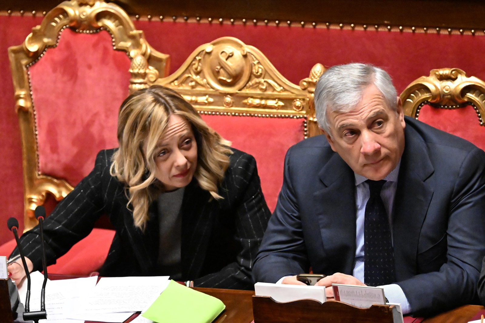 epa11025974 Italian Prime Minister Giorgia Meloni (L) and Foreign Minister Antonio Tajani (R) attend a session in the Senate, in Rome, Italy, 13 December 2023. Meloni reported to the upper house ahead of the European Council taking place in Brussels on 14 and 15 December.  EPA/CLAUDIO PERI