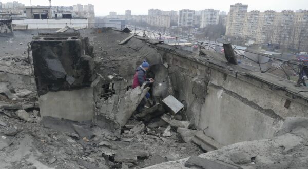 epa11052081 A local man inspects a damaged residential building after a drone attack in Odesa, southwestern Ukraine, 01 January 2024, amid the Russian invasion. At least one person died and three others were injured during an overnight attack in the Odesa region, the head of the Odesa Regional Military Administration Oleh Kiper wrote on telegram. The Ukrainian air force said they shot down 87 out of 90 'Shahed' drones in the overnight attack across several regions in Ukraine. Russian troops entered Ukraine in February 2022 starting a conflict that has provoked destruction and a humanitarian crisis.  EPA/IGOR TKACHENKO