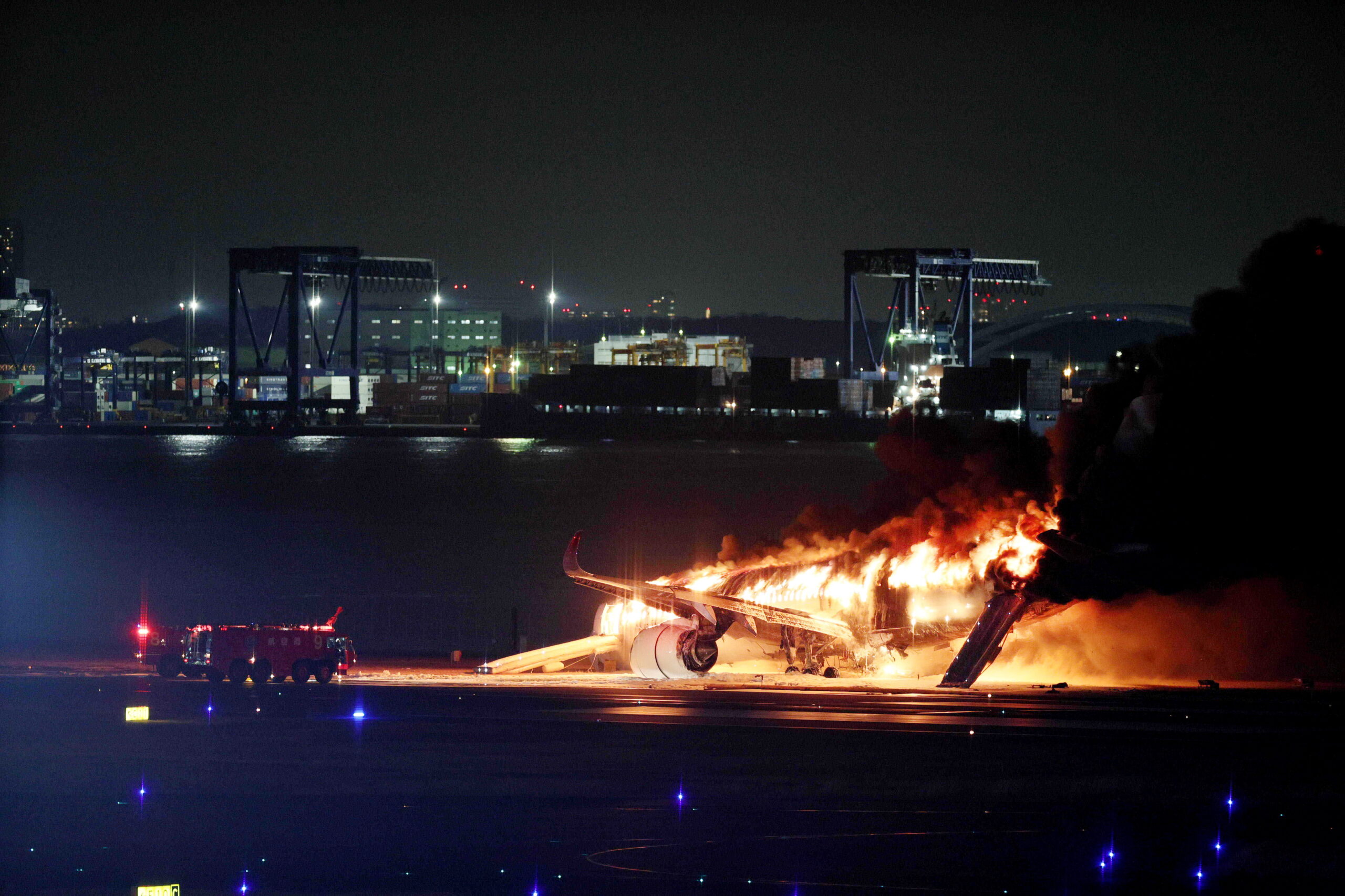epa11053245 A Japan Airline (JAL) passenger plane bursts into flames on the tarmac at Haneda Airport in Tokyo, Japan, 02 January 2024, after its landing. The JAL airplane apparently collided with a Japan Coast Guard plane as it landed. All 379 people on the JAL plane, including 367 passengers and 12 crew members, have been safely evacuated, according to JAL.  EPA/JIJI PRESS JAPAN OUT EDITORIAL USE ONLY/