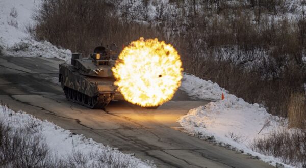 epa11056078 An undated handout photo made available by the South Korean Army shows K1A2 combat tank firing at the Seungjin Fire Training Field in Pocheon, South Korea, (issued 04 January 2024), during live-fire drills that the Army's Capital Mechanized Infantry Division has conducted with US forces since 29 December 2023.  EPA/ROK ARMY / HANDOUT SOUTH KOREA OUT HANDOUT EDITORIAL USE ONLY/NO SALES HANDOUT EDITORIAL USE ONLY/NO SALES