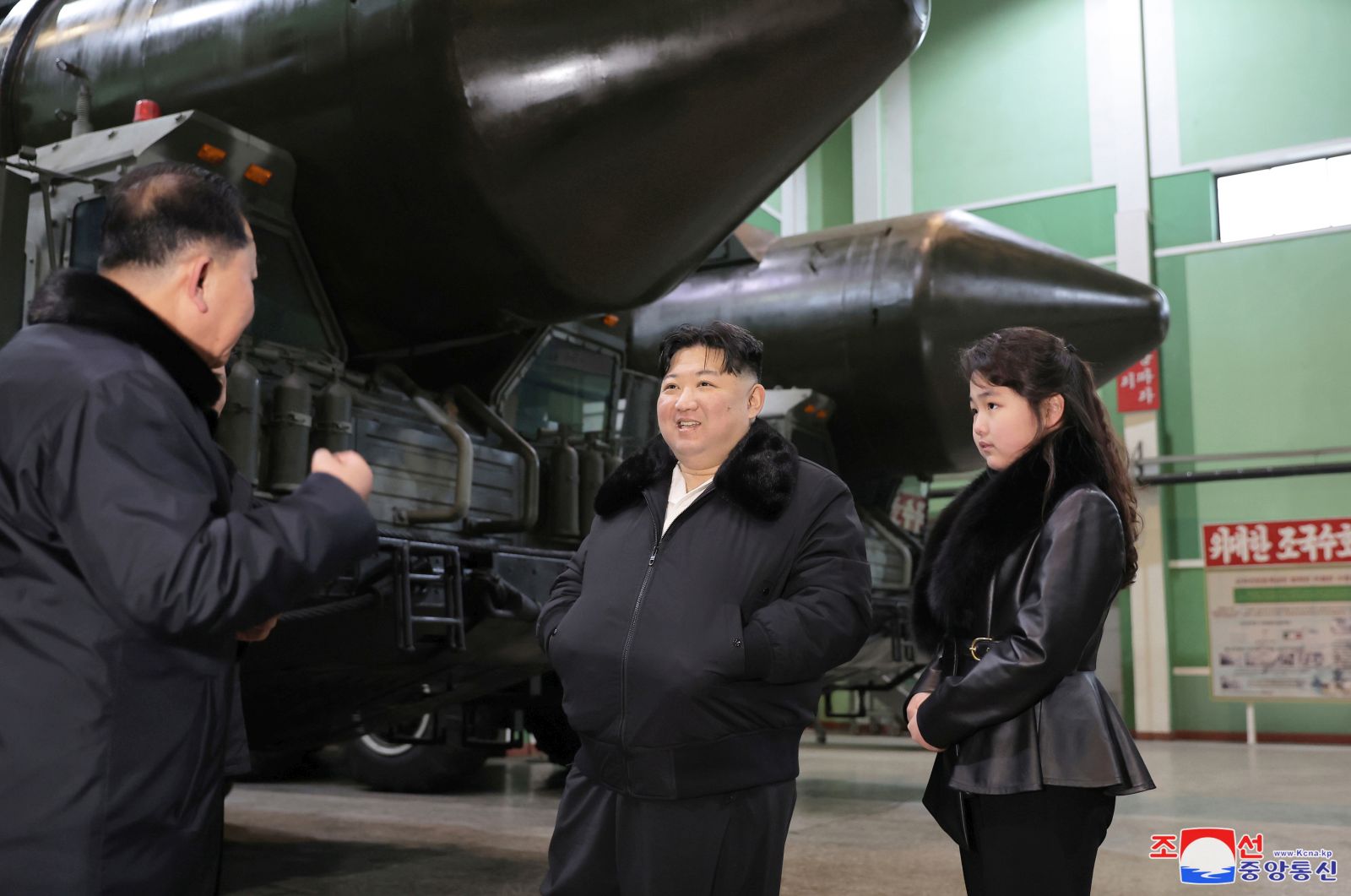 epa11057956 An undated photo released by the official North Korean Central News Agency (KCNA) on 05 January 2024 shows North Korean leader Kim Jong Un and his daughter Ju Ae inspecting a missile launcher production facility in an undisclosed location in North Korea. According to KCNA, Kim Jong Un calls for expanded production of 'various TELs (transporter erector launcher) for tactical and strategic weapon' for the country to be 'firmly prepared for a military showdown with the enemy'.  EPA/KCNA   EDITORIAL USE ONLY  EDITORIAL USE ONLY