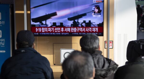 epa11058058 People watch the news on a TV at a station in Seoul, South Korea, 05 January 2024. According to South Korea's Joint Chiefs of Staff (JCS), North Korea fired some 200 artillery shells into waters off its western coast on 05 January morning, towards the South's Yeonpyeong island. Civilians on the islands of Yeonpyeong and Baengnyeong have been ordered to evacuate into shelters, South Korean officials said.  EPA/JEON HEON-KYUN
