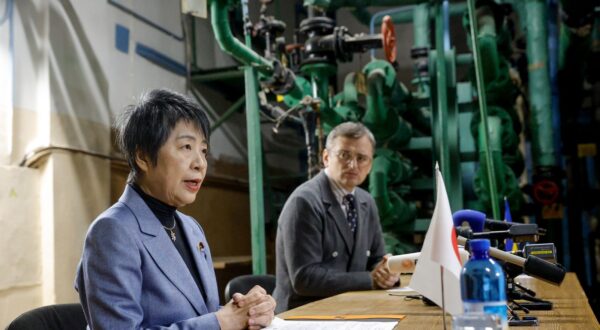 epa11062300 Japanese Foreign Minister Yoko Kamikawa (L) and her Ukrainian counterpart Dmytro Kuleba (R) hold a press conference in the basement of a building during an air raid alarm after their meeting in Kyiv (Kiev), Ukraine, 07 January 2024. The Japanese foreign affair minister arrived in Kyiv to meet with top Ukrainian officials amid the Russian invasion. Russian troops entered Ukrainian territory in February 2022, starting a conflict that has provoked destruction and a humanitarian crisis.  EPA/Sergey Dolzhenko
