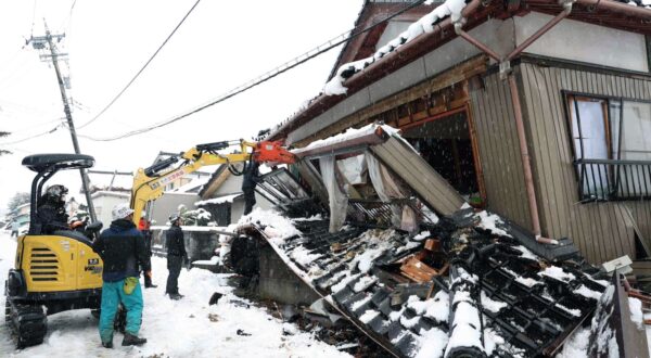 epa11064214 A volunteer works to clear a collapsed house in Suzu, Ishikawa Prefecture, Japan, 08 January 2024. According to latest data by the Ishikawa Prefecture Government, at least 168 people were killed and 323 persons are still missing following a magnitude 7 earthquake (the USGS listed the earthquake as 7.6 magnitude) which occurred on 01 January. About 28,000 residents in Ishikawa Prefecture have evacuated to 355 makeshift evacuation centers.  EPA/JIJI PRESS JAPAN OUT EDITORIAL USE ONLY
