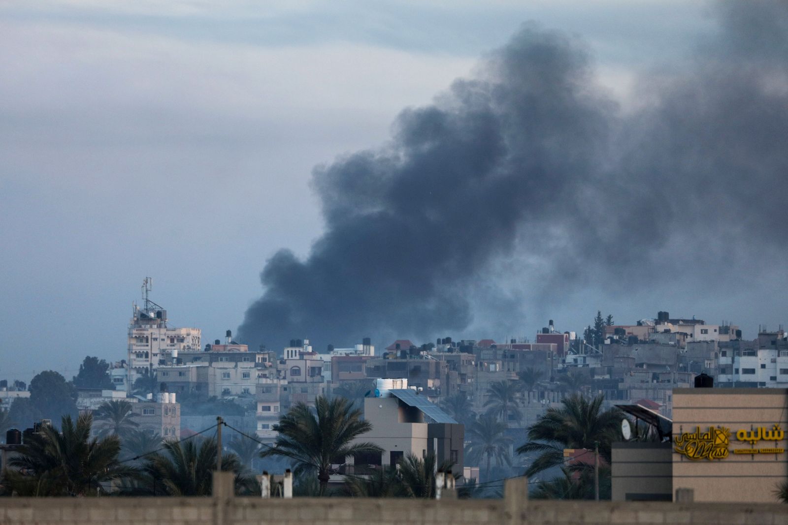 epa11065013 Smoke rises during Israeli military operations in the east of Al Maghazi, Al Bureij and Al Nuseirat refugee camps in the Gaza Strip, 08 January 2024. More than 22,800 Palestinians and at least 1,300 Israelis have been killed, according to the Palestinian Health Ministry and the Israel Defense Forces (IDF), since Hamas militants launched an attack against Israel from the Gaza Strip on 07 October, and the Israeli operations in Gaza and the West Bank which followed it.  EPA/MOHAMMED SABER