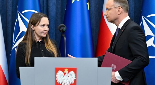 epa11069559 President of Poland Andrzej Duda (R) and Mariusz Kaminski's wife Barbara Kaminska (L) during a statement at the Presidential Palace in Warsaw, Poland, 11 January 2024. The president announced that he had initiated pardon proceedings against Mariusz Kaminski and Maciej Wasik. The former head of the CBA and former interior minister and his former deputy in December 2023 were sentenced to two years in prison for abuse of power when they led an anti-corruption office in 2007.  EPA/Radek Pietruszka  POLAND OUT