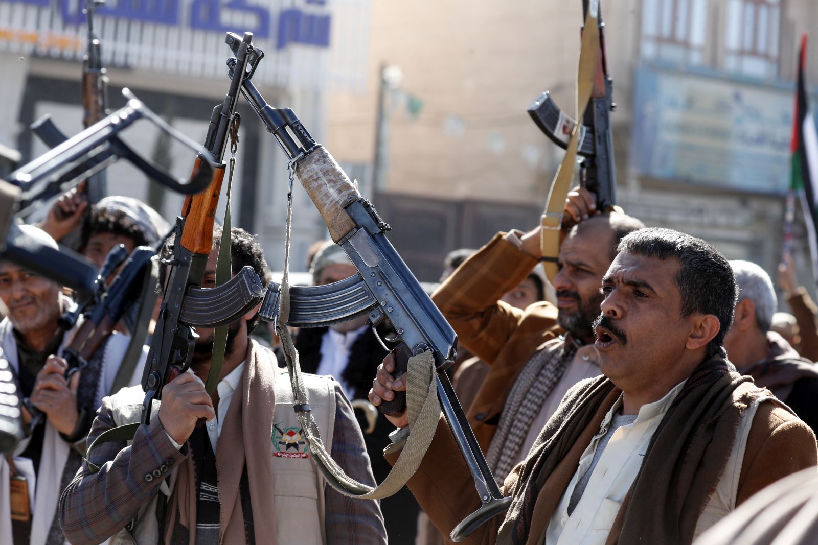 epa11070044 Newly-recruited members of the Houthis' popular army hold up their weapons during a gathering at the end of a military training, in Sana'a, Yemen, 11 January 2024. Yemen's Houthis top leader Abdul-Malik Al-Houthi has warned in a televised address on 11 January that any US military operation against his movement will never go unanswered, two days after the Houthis launched a large-scale missile and drone attack against international shipping lanes in the Red Sea, in response to a previous US Navy attack on Houthi boats in the Red Sea that killed 10 Houthi fighters on 31 December 2023. The US Department of Defense had announced in December 2023 a multinational operation to safeguard trade and to protect ships in the Red Sea amid the recent escalation in Houthi attacks. The Houthis have vowed to attack Israeli-bound ships and prevent them from navigating in the Red Sea and the Bab al-Mandab Strait in retaliation for Israel's airstrikes on the Gaza Strip.  EPA/YAHYA ARHAB