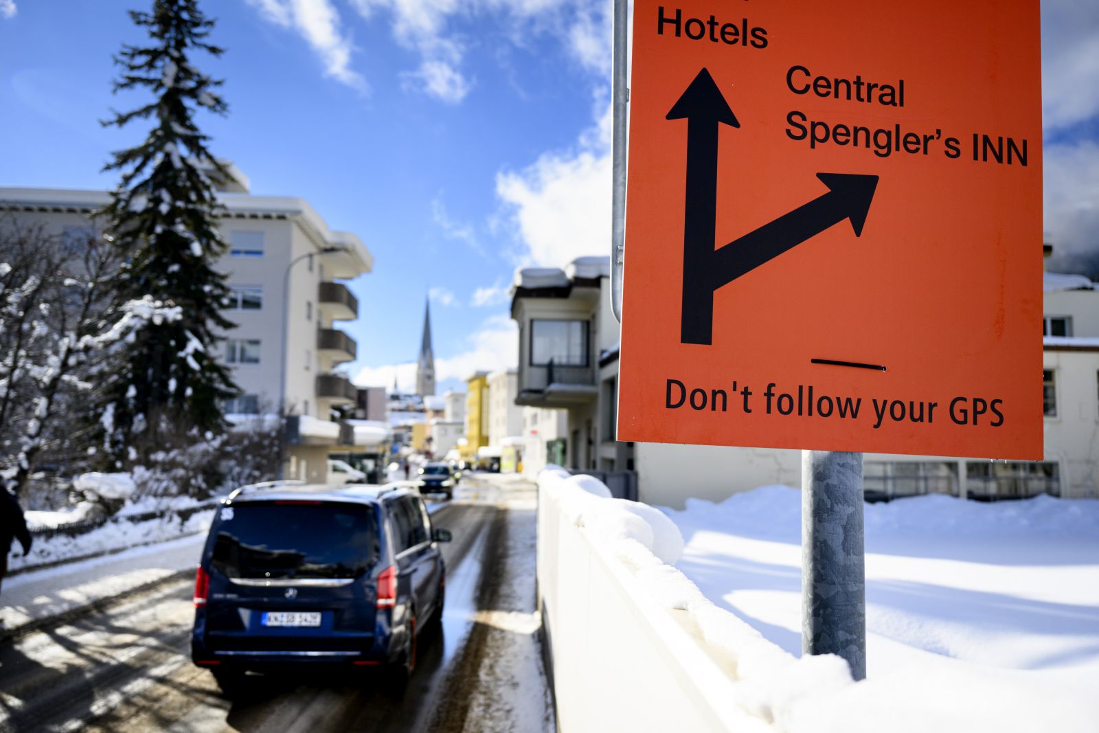 epa11079492 A road sign reading 'Don't follow your GPS' is placed in a street prior the 54th annual meeting of the World Economic Forum, WEF, in Davos, Switzerland, 15 January 2024. The meeting brings together entrepreneurs, scientists, corporate and political leaders in Davos under the topic 'Rebuilding Trust' from 15 to 19 January.  EPA/LAURENT GILLIERON