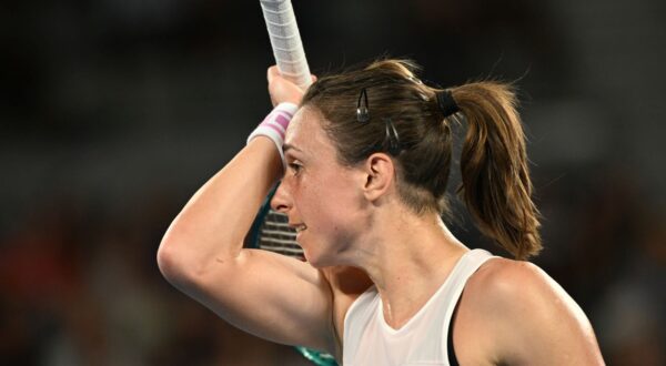 epa11082376 Petra Martic of Croatia wipes her forehead during her first round match against Ajla Tomljanovic of Australia on Day 3 of the 2024 Australian Open at Melbourne Park in Melbourne, Australia, 16 January 2024.  EPA/JAMES ROSS AUSTRALIA AND NEW ZEALAND OUT