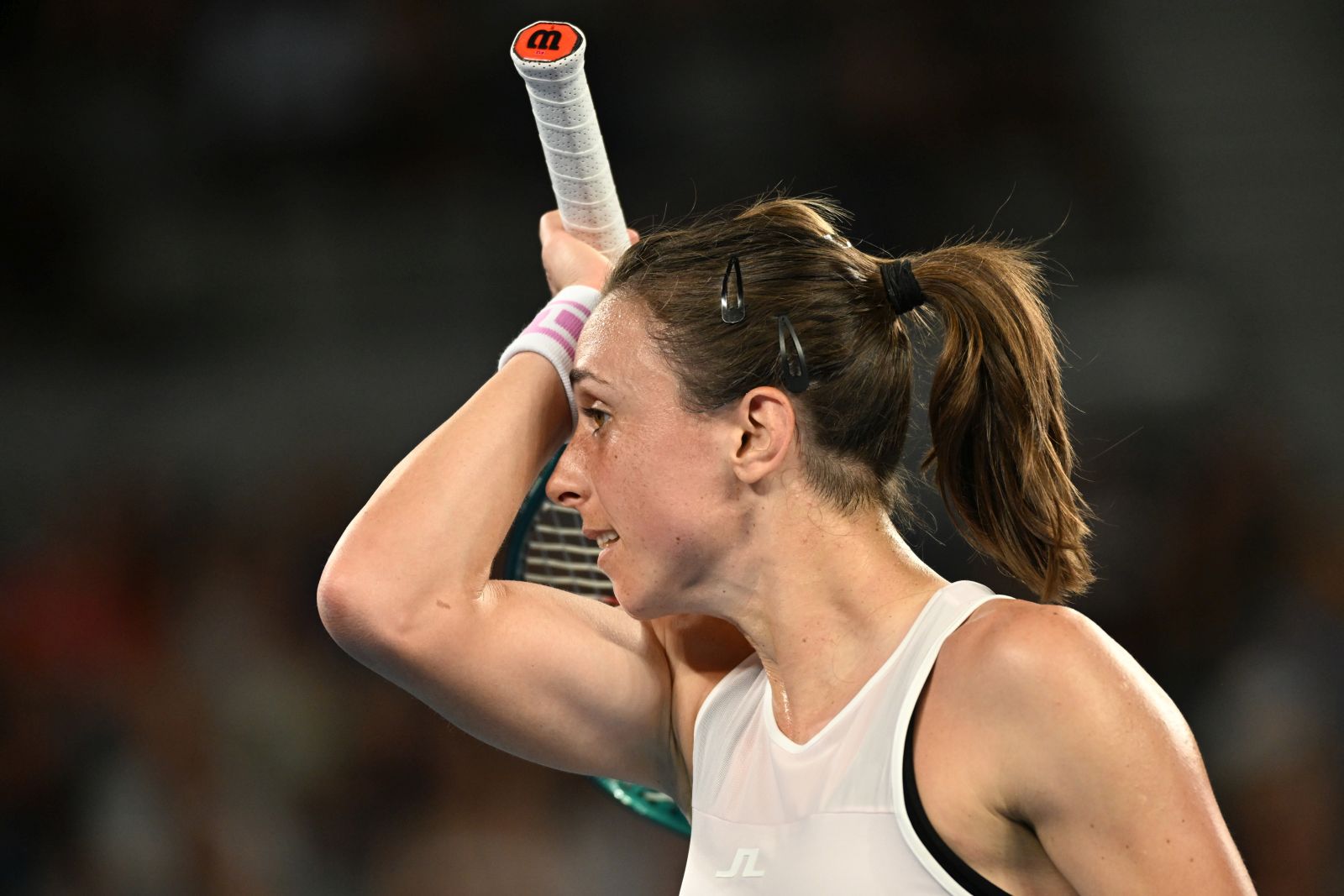 epa11082376 Petra Martic of Croatia wipes her forehead during her first round match against Ajla Tomljanovic of Australia on Day 3 of the 2024 Australian Open at Melbourne Park in Melbourne, Australia, 16 January 2024.  EPA/JAMES ROSS AUSTRALIA AND NEW ZEALAND OUT