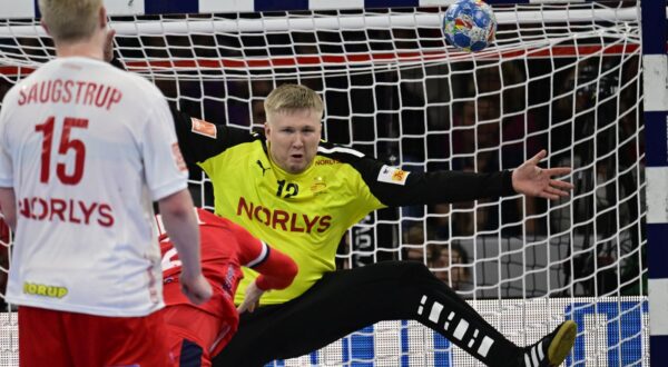 epa11094985 Denmark’s Emil Nielsenl reacts after scoring during the EHF Men's EURO 2024 main round handball match between Norway and Denmark in Hamburg, Germany, 21 January 2024.  EPA/FABIAN BIMMER